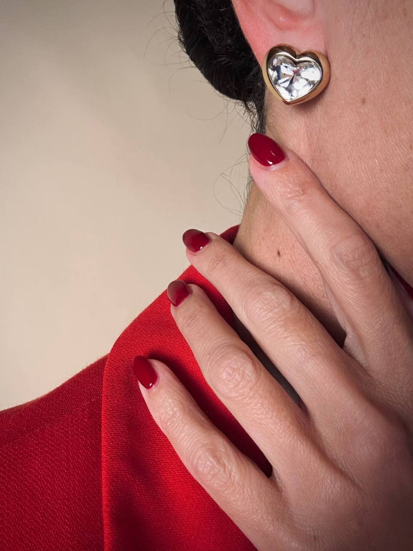 Clip dorate a forma di cuore con strass centrale