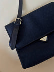 Borsa messenger in tessuto plastificato e pelle blu “Yves Saint Laurent”