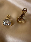 Clip dorate a forma di cuore con strass centrale