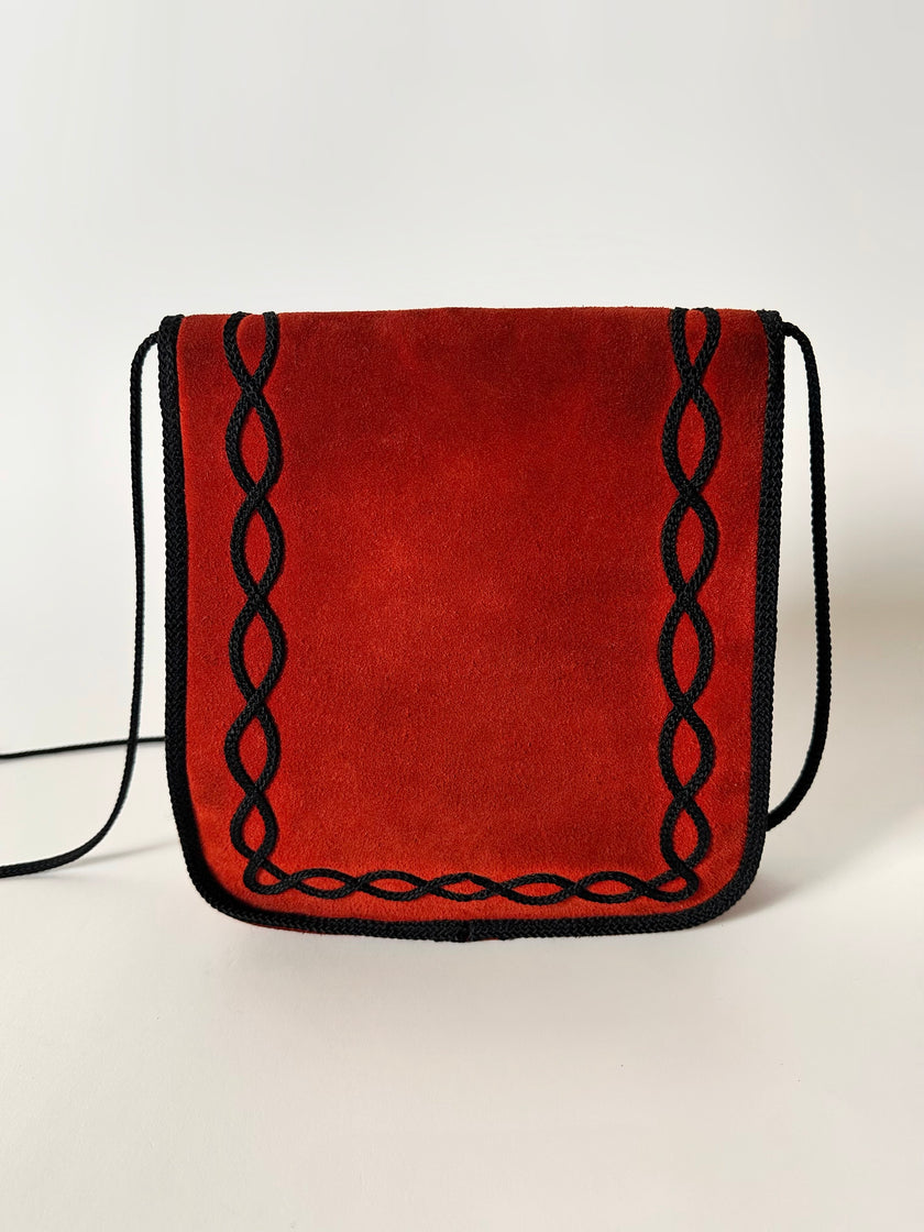 Borsa vintage Yves Saint Laurent in camoscio rosso con passamaneria nera
