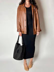 Secchiello vintage Yves Saint Laurent in tessuto nero millerighe con riporti in pelle