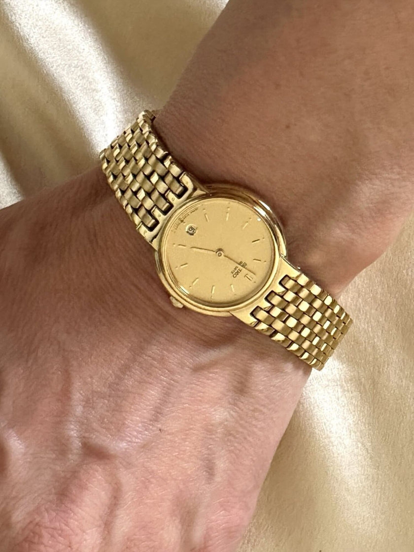 Orologio dorato con cinturino a bracciale “Seiko”