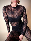 Jumpsuit con staffe in pizzo nero “La Perla”