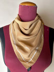 Foulard vintage Yves Saint Laurent in seta biscotto con profili e logo bianchi