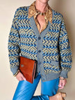 Cardigan Missoni Sport con pattern geometrico e trama tridimensionale nei toni del verde e blu