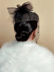 Cappellino con veletta in lurex oro e tulle nero Marzi Firenze