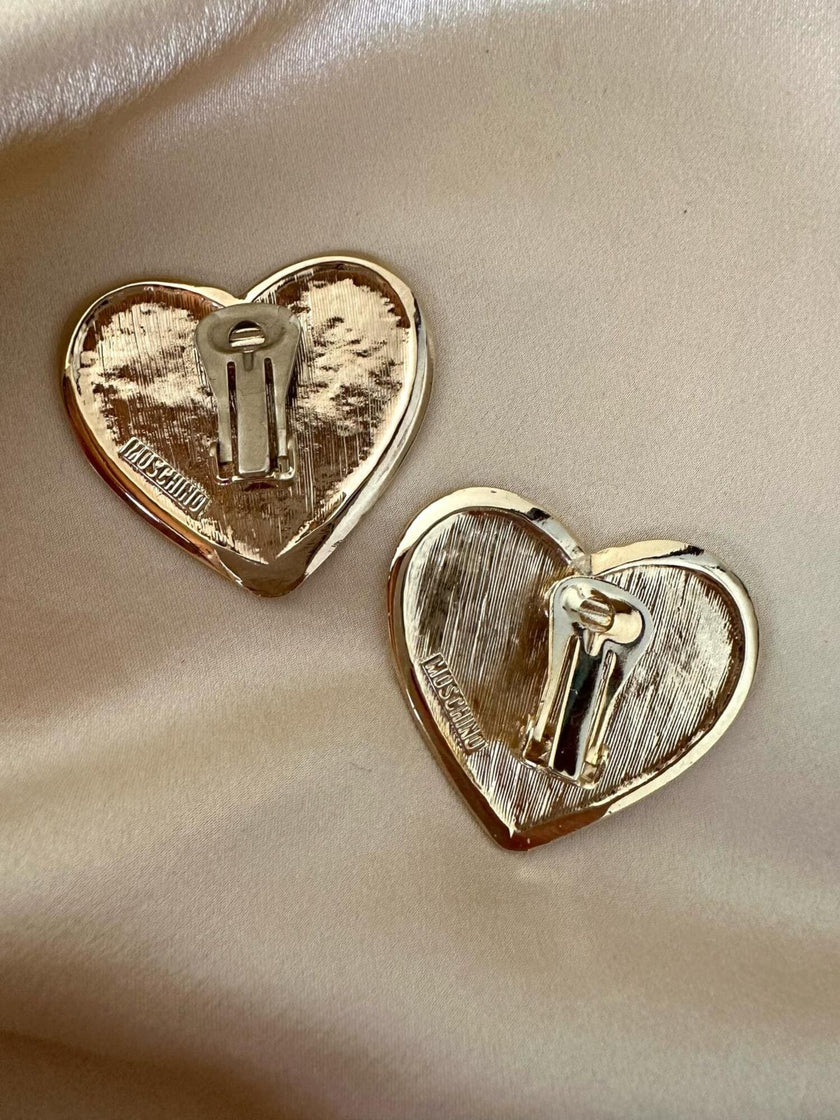Maxi clip dorate a forma di cuore “Moschino”