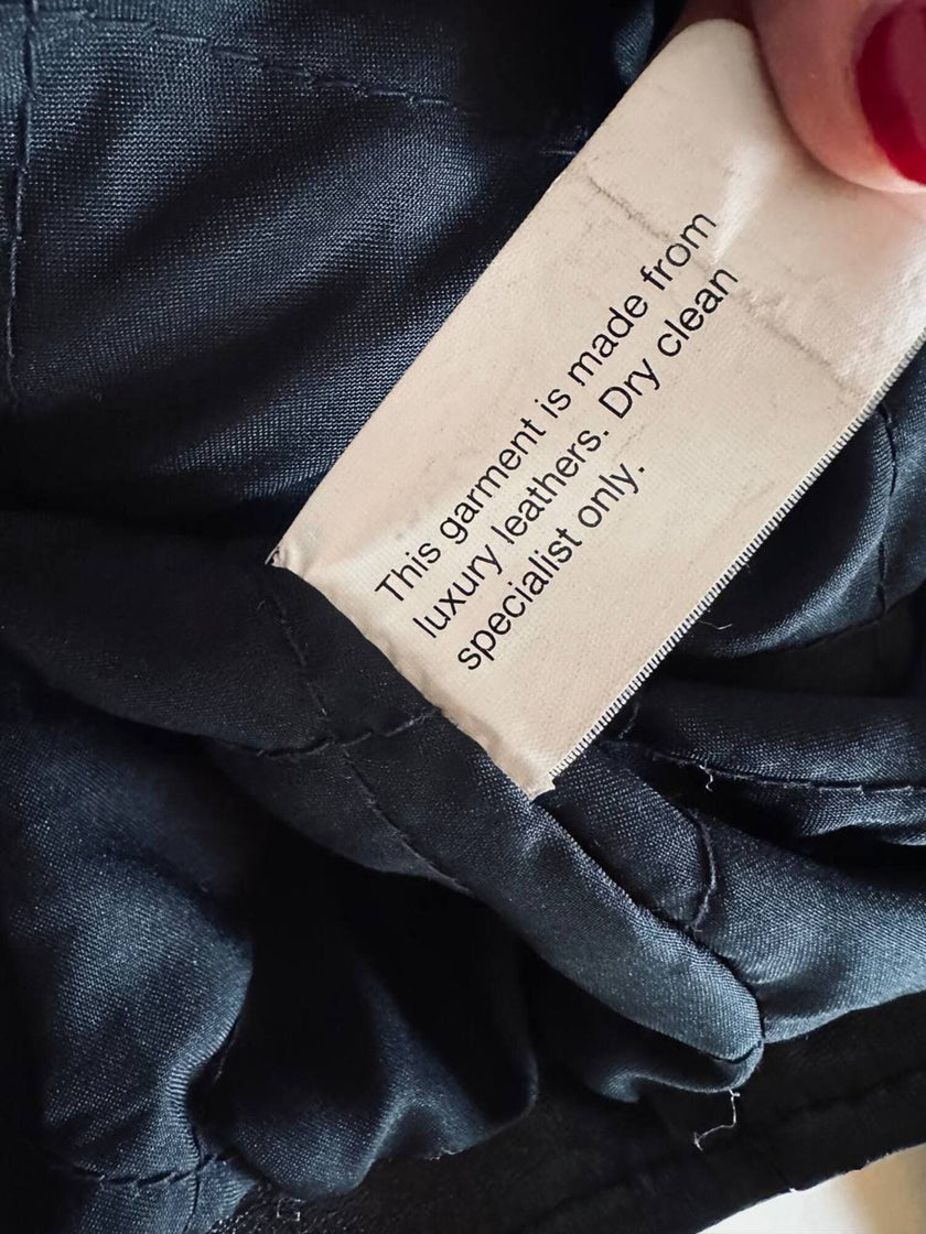 Giacca biker vintage in pregiata pelle nera con fodera trapuntata