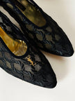 Mini spilla vintage logo Yves Saint Laurent in metallo dorato