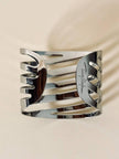 Manchette in metallo scavato argento “Thierry Mugler”