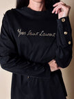 Maglia vintage Yves Saint Laurent in cotone nero con firma ricamata e bottoni dorati