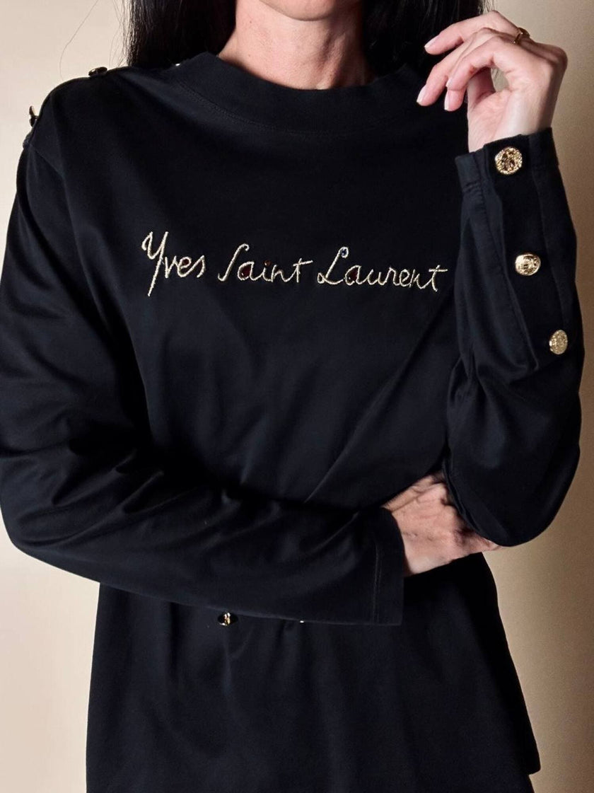 Maglia vintage Yves Saint Laurent in cotone nero con firma ricamata e bottoni dorati