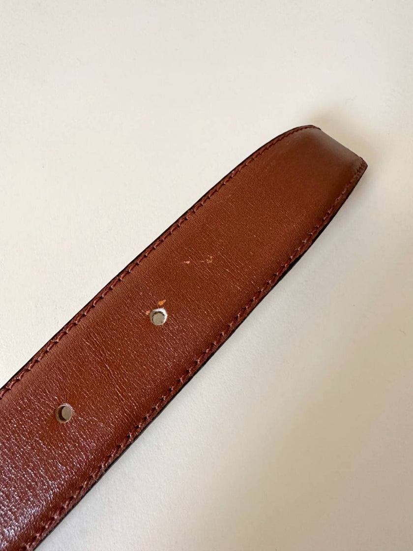 Vintage Yves Saint Laurent tan leather belt with an octagonal enamel buckle and YSL logo