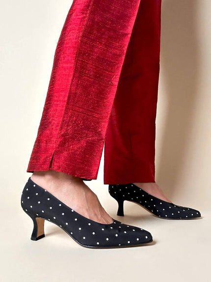 Décolleté in tessuto nero a pois bianchi “Escada”