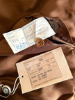 Cappotto lungo oversize in lana e cachemire cammello scuro con cintura in coordinato