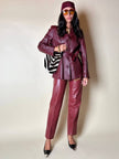Pantalone in pelle mattone rosato a vita alta con pince e cintura in coordinato La Matta