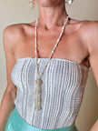 Collana lunga con nappa realizzata con perle naturali d’acqua dolce