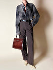 Borsa a trapezio in pelle di coccodrillo color cognac con tracolla e hardware oro Idra
