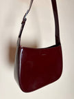 Borsa hobo Furla in pelle verniciata bordeaux