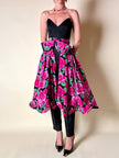 Gonna a ruota in seta fantasia floreale fucsia con maxi fiocco