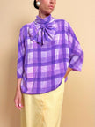Blusa in seta lilla con maxi fiocco
