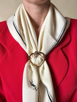 Ferma foulard dorato a forma di cuore “Yves Saint Laurent”