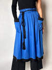 Gonna vintage Yves Saint Laurent in cotone bluette con profili neri e maxi tasche