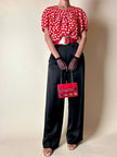 Mini abito rosso in seta jacquard a pois con fusciacca in coordinato “Fendi”