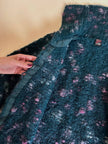 Cardigan in lana bouclé verde bottiglia con lavorazione bottonata multicolor