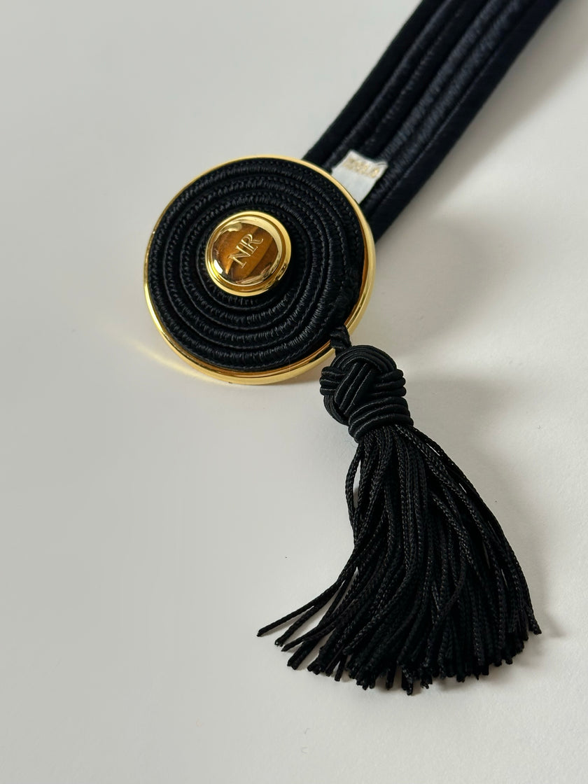 Cintura vintage Nina Ricci Paris in passamaneria elastica nera con fibbia gioiello e nappa couture