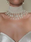 Maxi choker di perle bianche sintetiche