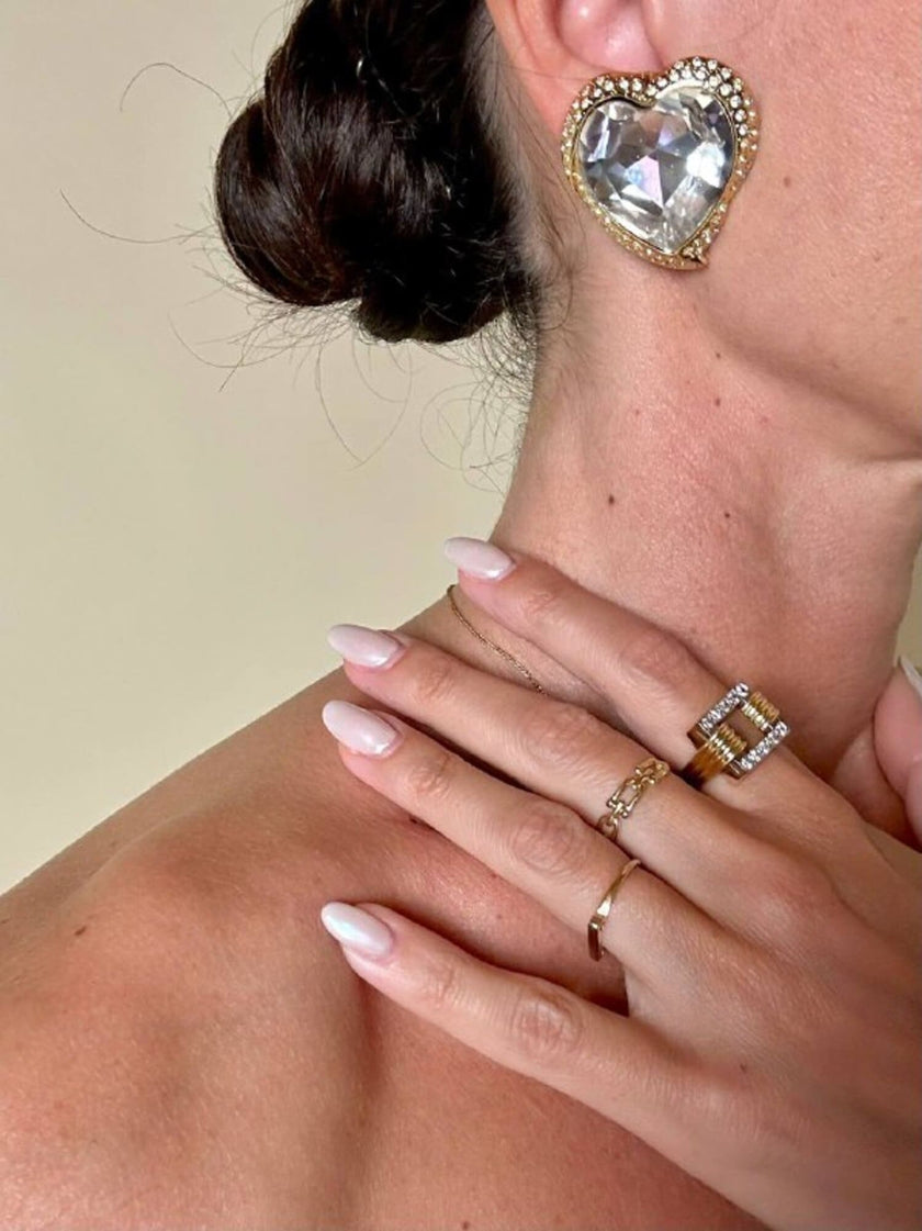 Clip oro con maxi cristalli a forma di cuore “Yves Saint Laurent”
