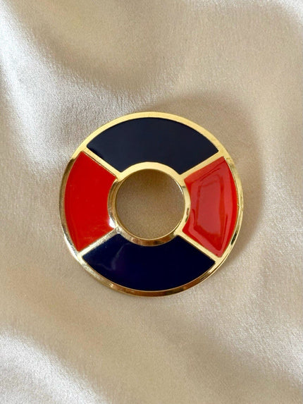 Spilla Yves Saint Laurent a forma di salvagente in metallo oro e smalto rosso e blu
