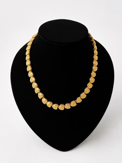 Vintage Degerny necklace with ornate gold hearts