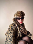 Eco pelliccia leopardata con maxi bottoni neri