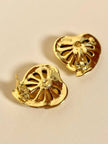 Clip oro con maxi cristalli a forma di cuore “Yves Saint Laurent”