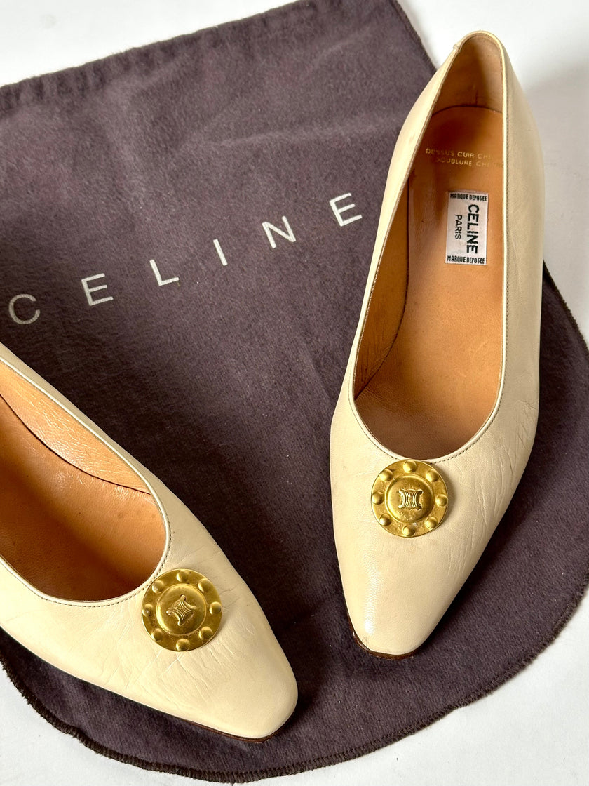 Ballerine vintage Celine Paris in pelle avorio con medaglioni dorati logati