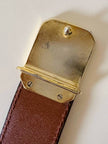 Vintage Yves Saint Laurent tan leather belt with an octagonal enamel buckle and YSL logo