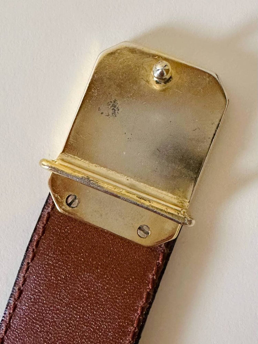 Vintage Yves Saint Laurent tan leather belt with an octagonal enamel buckle and YSL logo