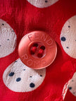 Mini abito rosso in seta jacquard a pois con fusciacca in coordinato “Fendi”