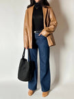 Vintage tan leather jacket with hand-stitched detailing by Claude Collections