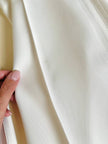 Pantalone bianco latte a vita alta con piega “Byblos”