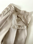 Pantalone vintage in fresco di lana greige con pince e abbottonatura su ambo i lati