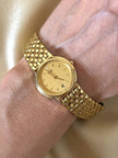 Orologio dorato con cinturino a bracciale “Seiko”