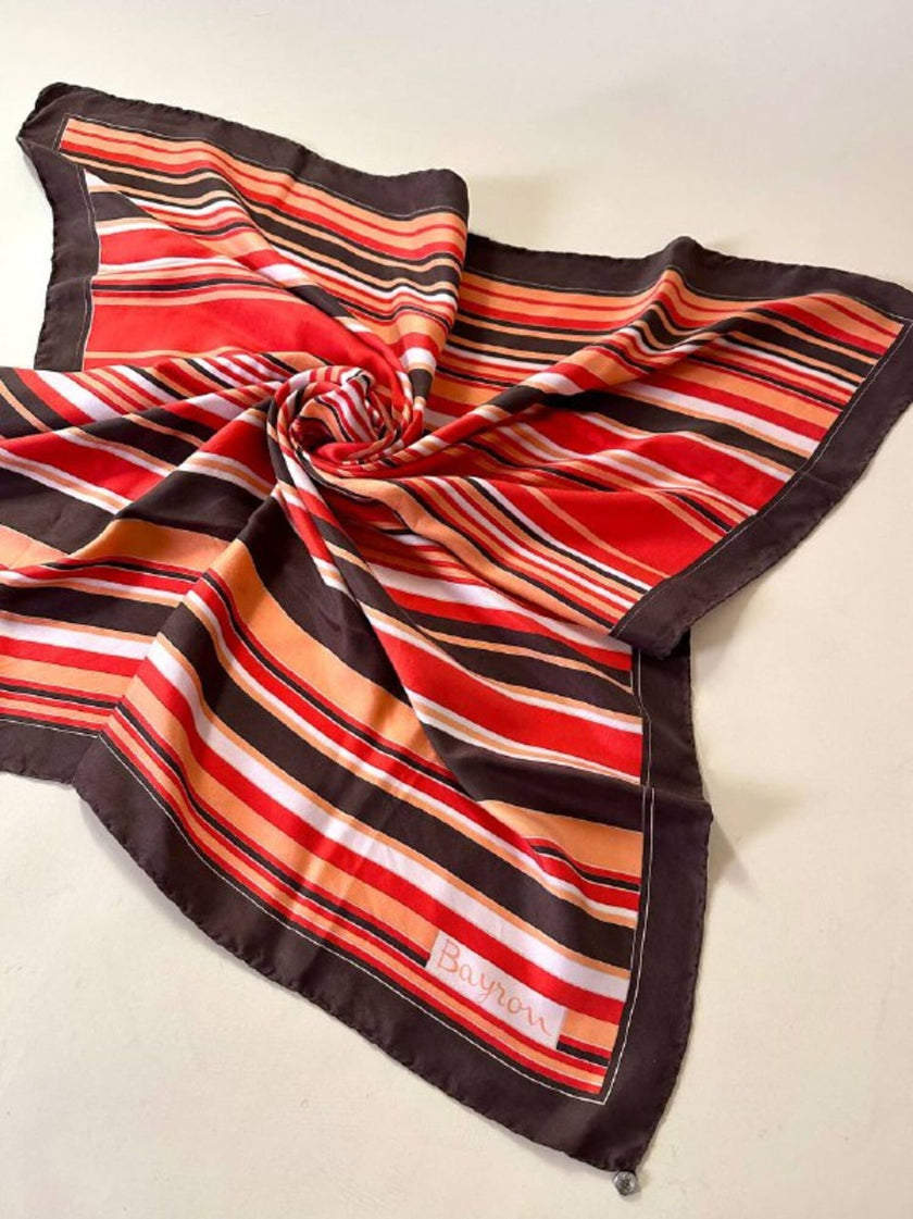 Foulard Byron in pura seta fantasia a righe trasversali declinata in nuance calde