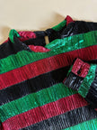 Blusa in lamé goffrato a righe orizzontali multicolor