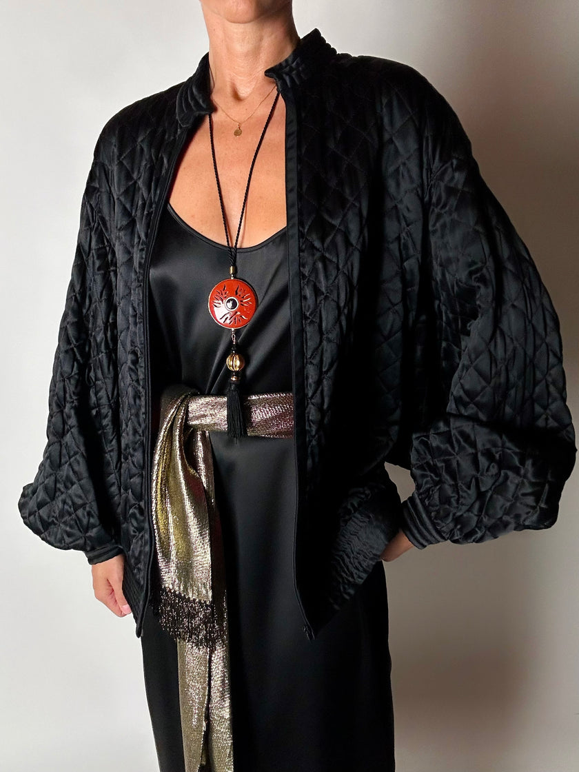 Bomber vintage Valentino Boutique in raso di seta nera trapuntato con fodera rossa