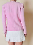 Blazer in lana bouclé rosa con bottoni gioiello logati in madreperla “Yves Saint Laurent”