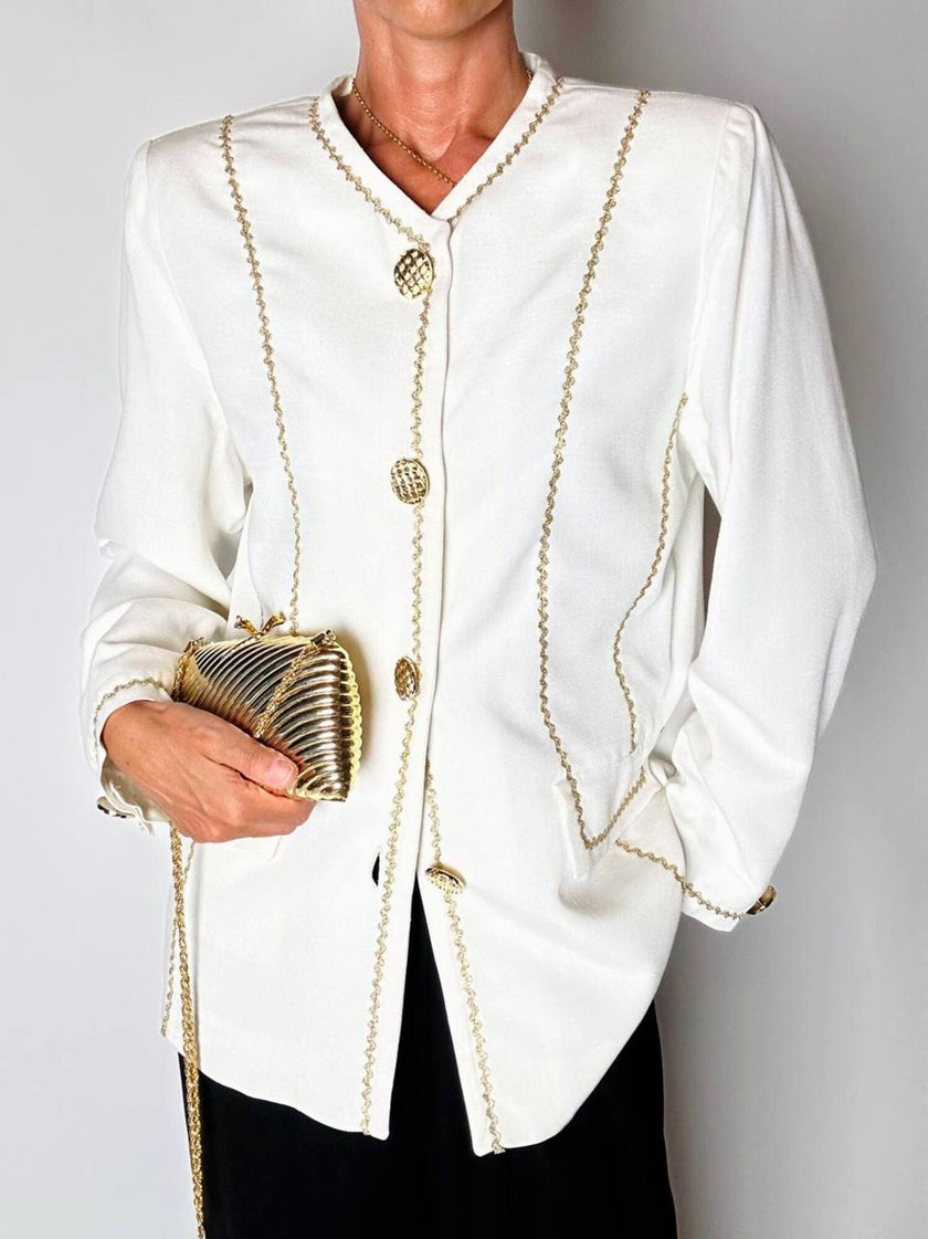 Giacca vintage Yves Saint Laurent bianco latte con serpentine dorate e bottoni gioiello