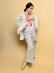 Lace tailleur con piume di marabù